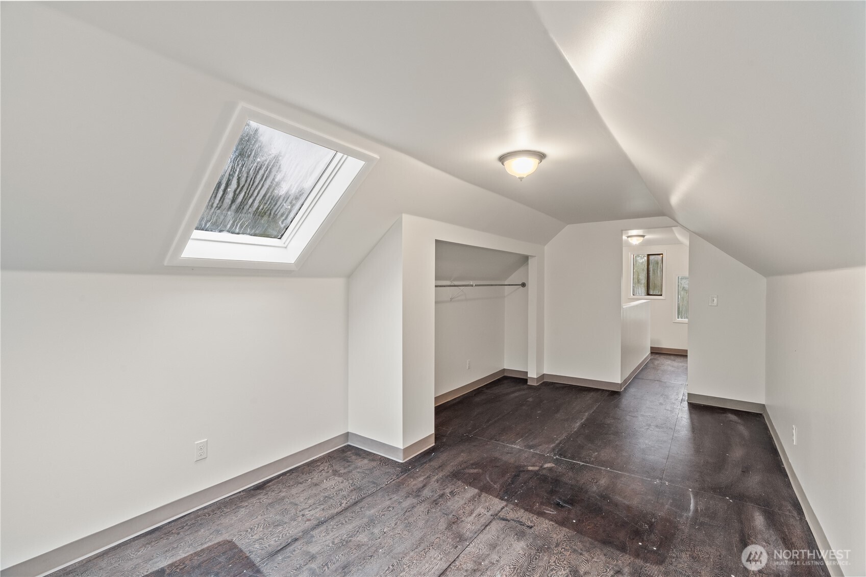 330 Wheeler Avenue Hoquiam, WA 98550 - Photo 15 of 34 an empty room with wooden floor and windows