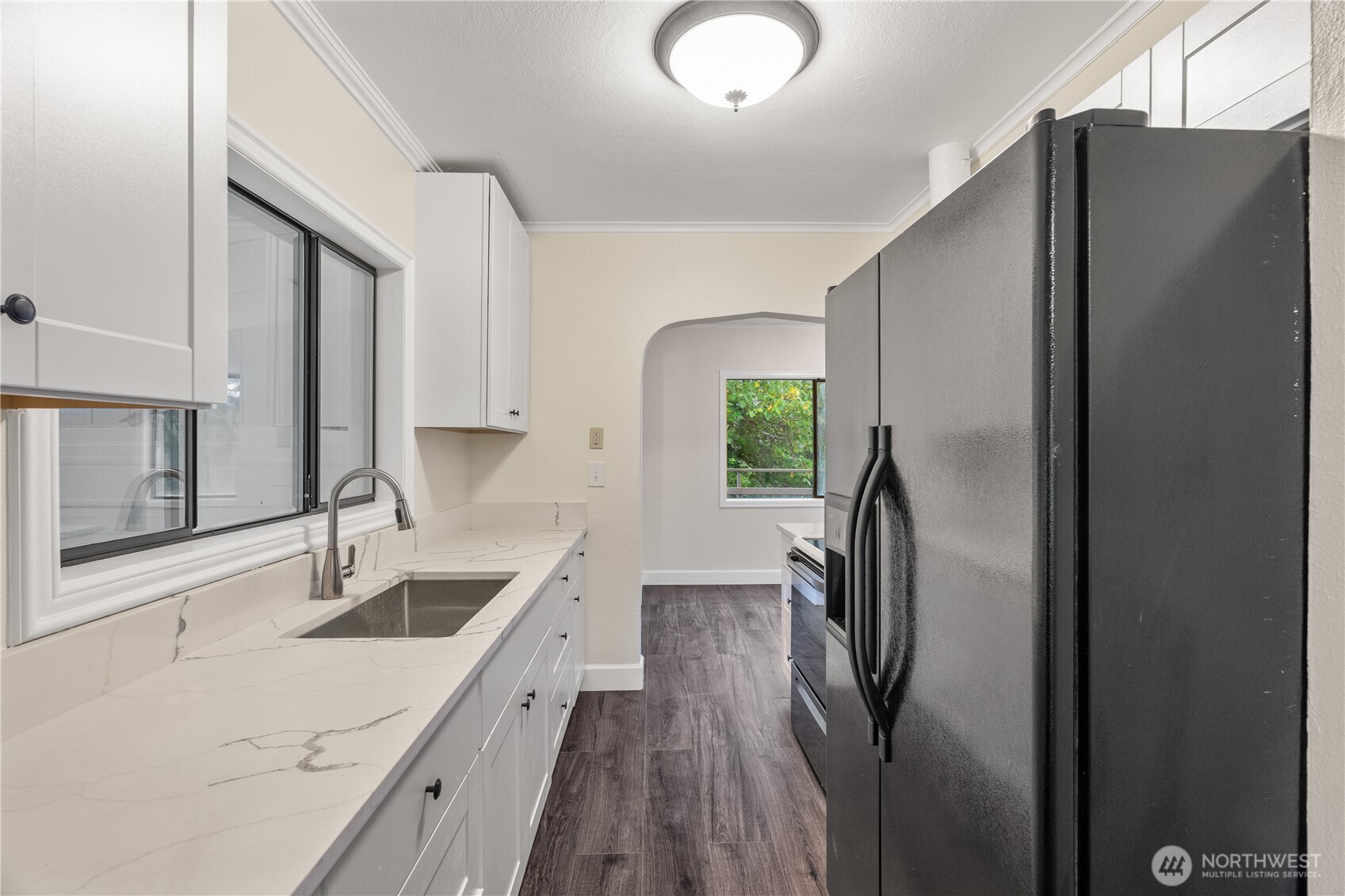 330 Wheeler Avenue Hoquiam, WA 98550 - Photo 16 of 34 a kitchen with stainless steel appliances granite countertop a refrigerator and a sink