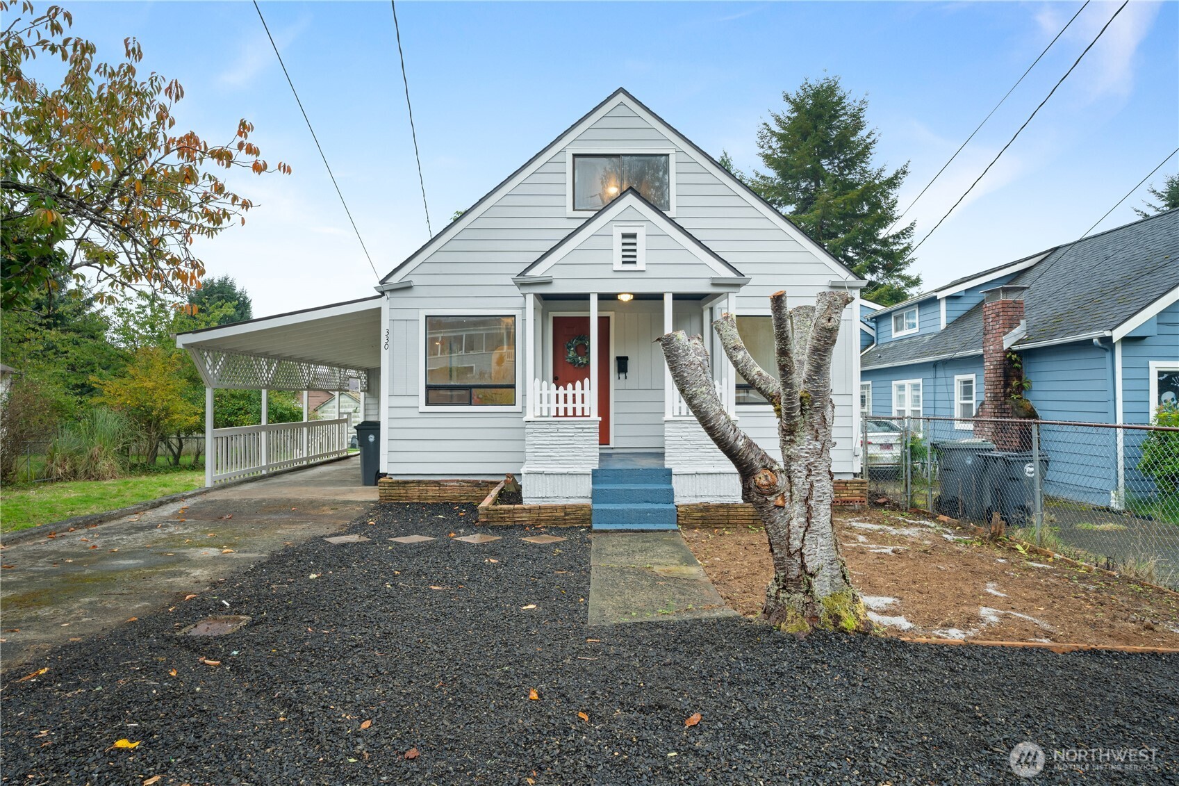 330 Wheeler Avenue Hoquiam, WA 98550 - Photo 2 of 34 a front view of a house with a yard