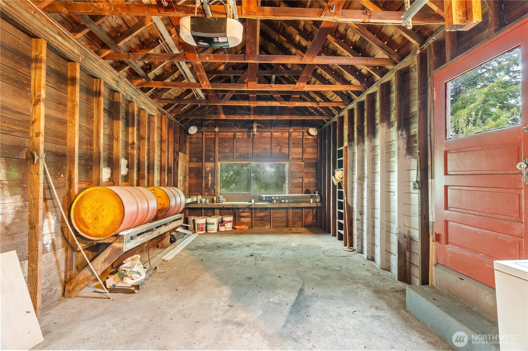 330 Wheeler Avenue Hoquiam, WA 98550 - Photo 23 of 34 a view of a room with wooden floor and iron walls