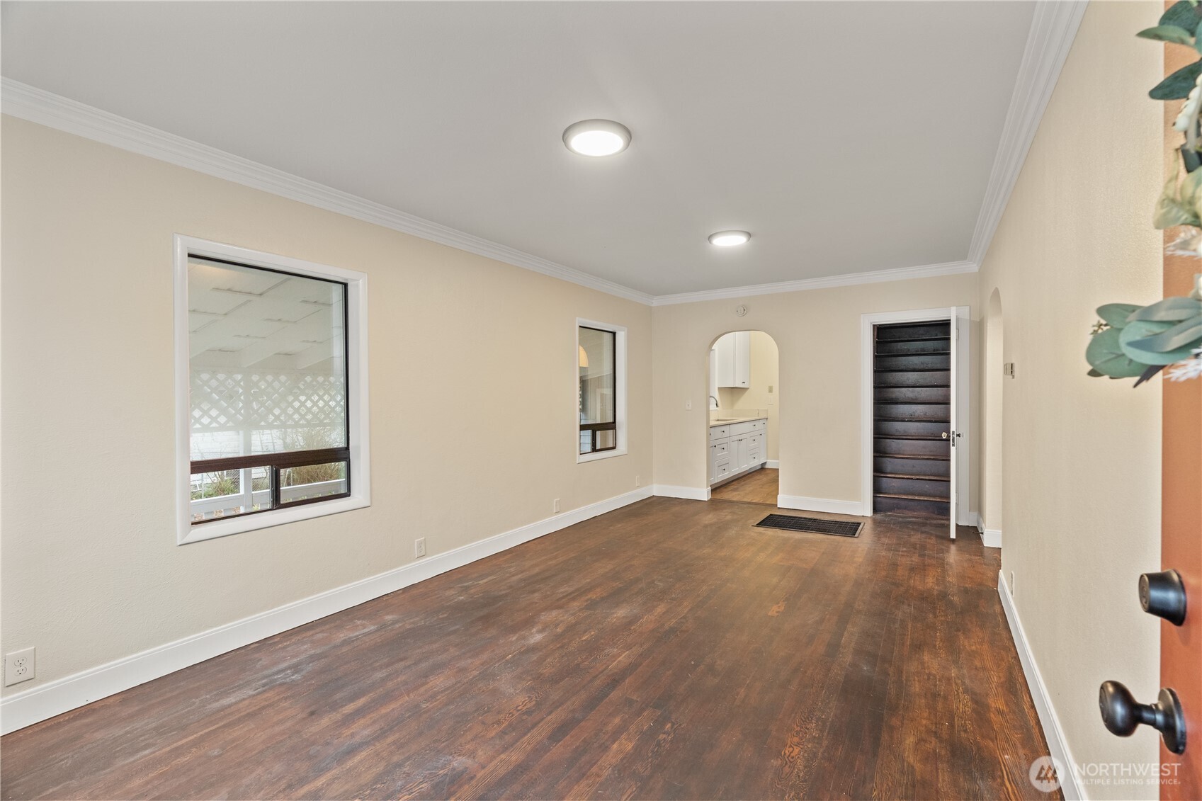 330 Wheeler Avenue Hoquiam, WA 98550 - Photo 4 of 34 a view of empty room with wooden floor and window
