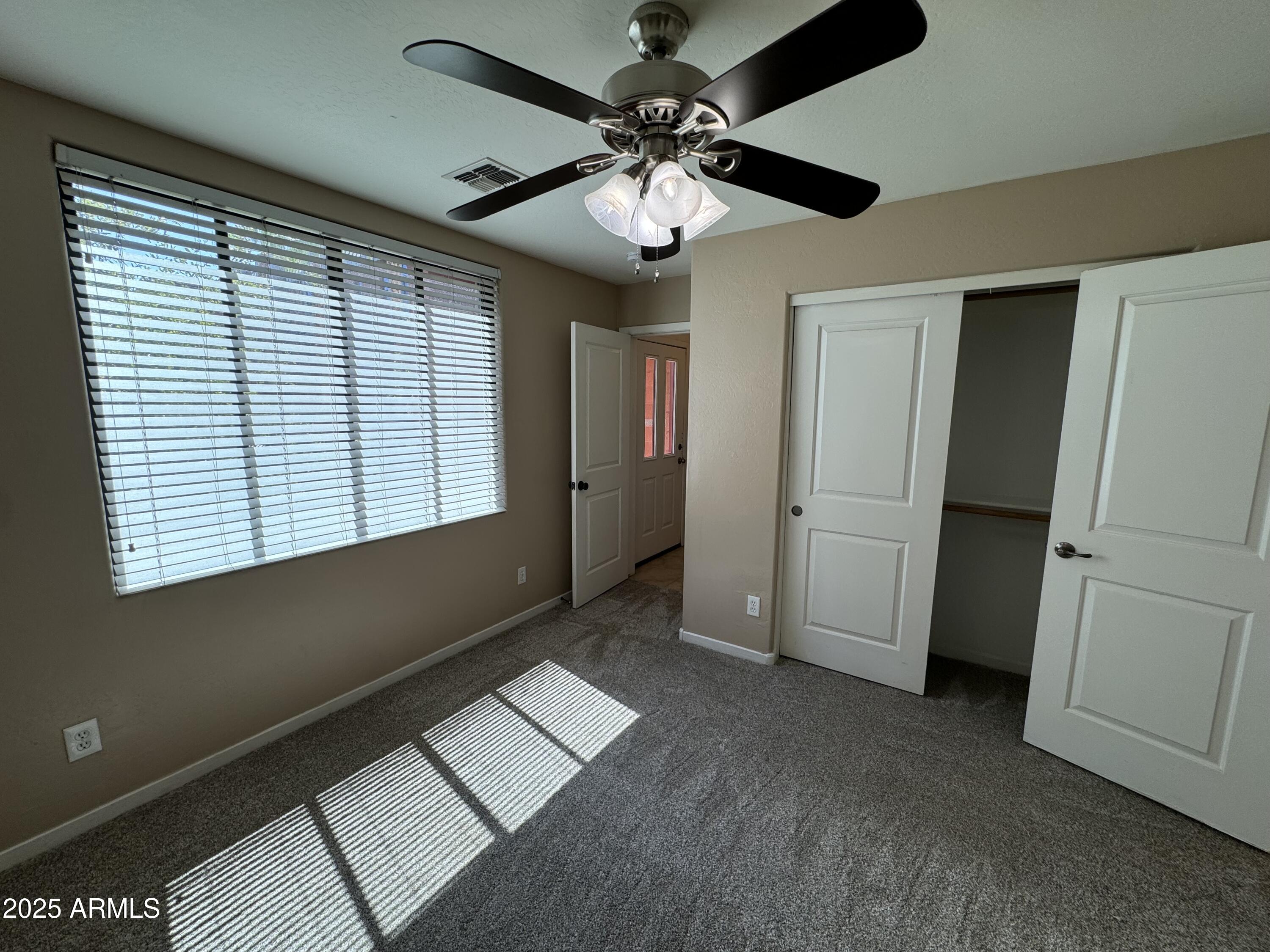 305 South Wilson Street, Unit 111 Tempe, AZ 85281 - Photo 46 of 48 a view of an empty room with a window