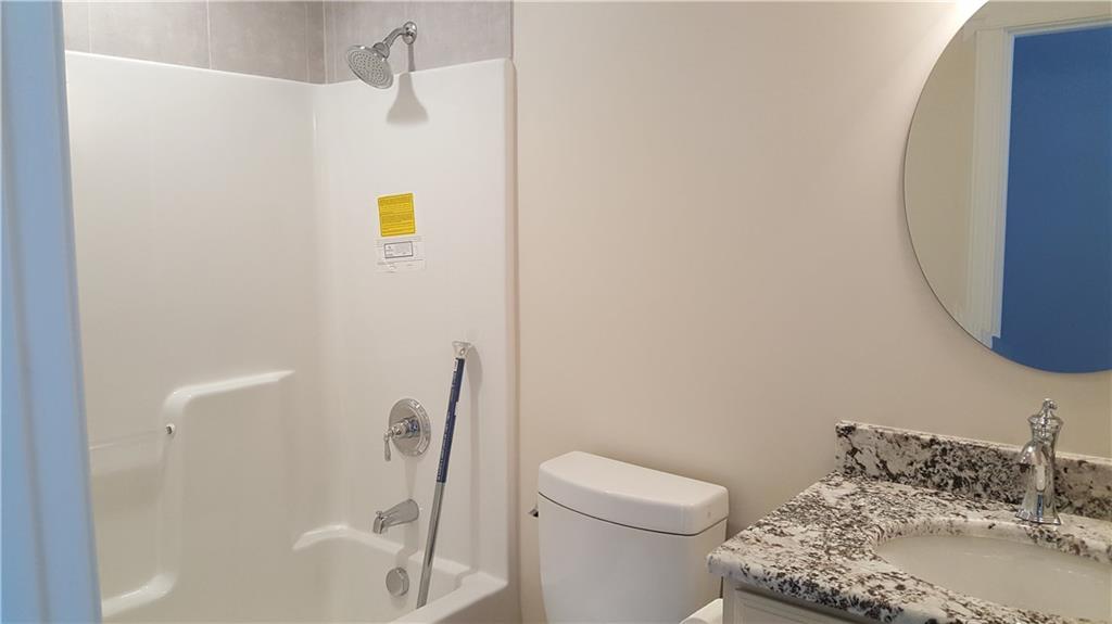 234 Pond Road Latrobe, PA 15650 - Photo 16 of 25 Main full bath, granite tops, ceramic tile floor