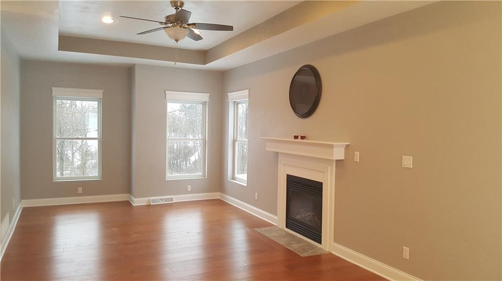 234 Pond Road Latrobe, PA 15650 - Photo 3 of 25 Living room with Hardwood floors, gas fireplace