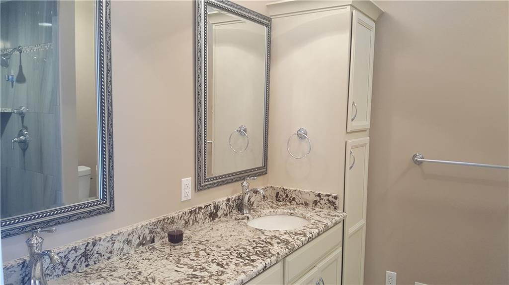 234 Pond Road Latrobe, PA 15650 - Photo 10 of 25 Stunning master bath granite tops, ceramic tile floors and walk-in shower