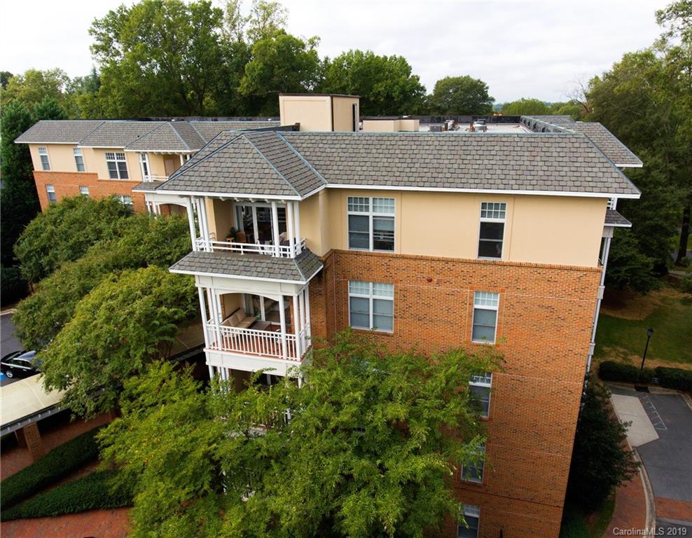 1301 Queens Road, Unit 203 Charlotte, NC 28207 - Photo 11 of 12 an aerial view of a house with a yard