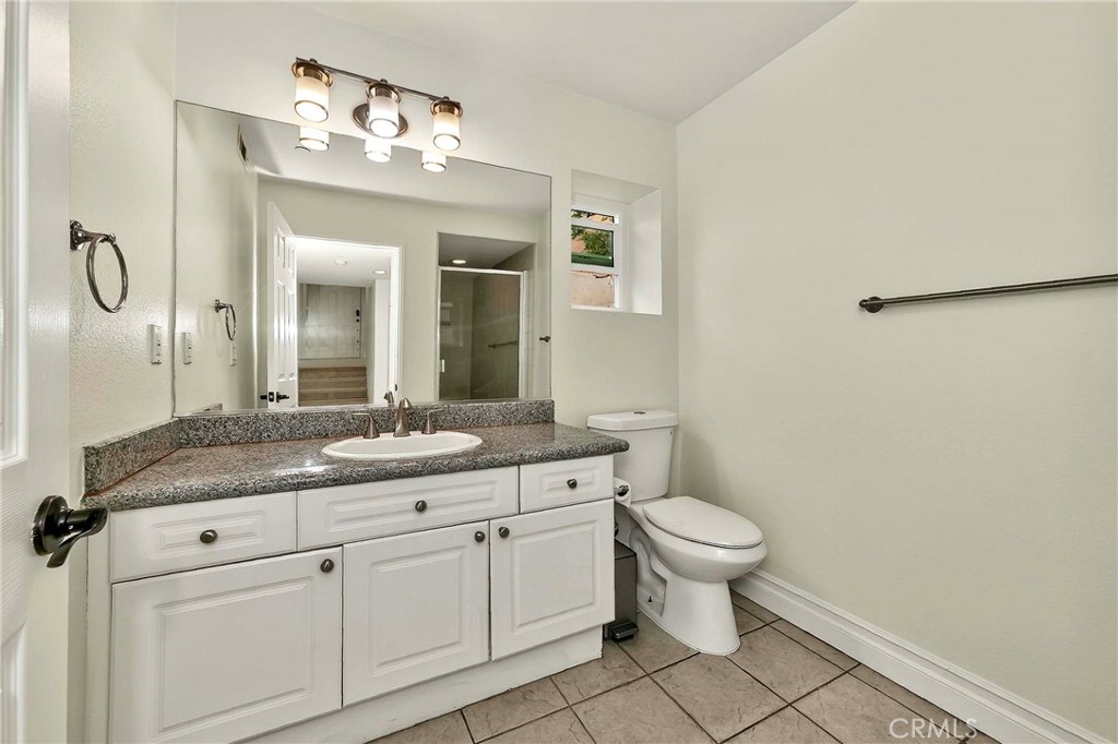 24005 Los Codona Avenue Torrance, CA 90505 - Photo 23 of 28 Downstairs private room and bathroom