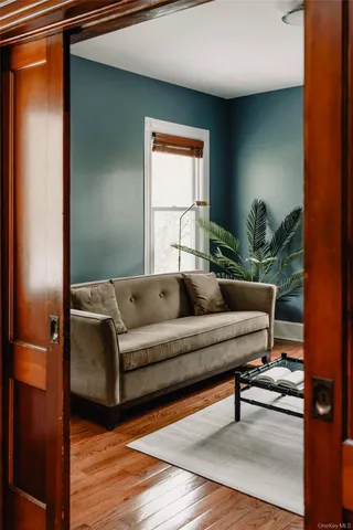 a living room with furniture and a window