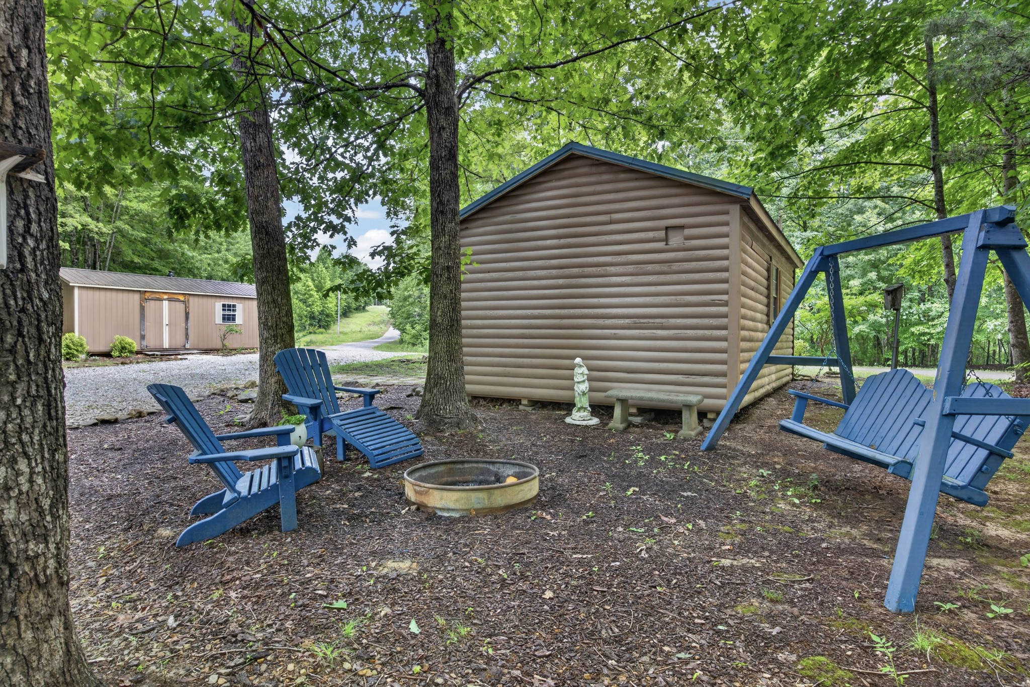 55214 Maynard Ridge Lane Crawford, TN 38554 - Photo 22 of 32 a view of backyard with deck and outdoor seating