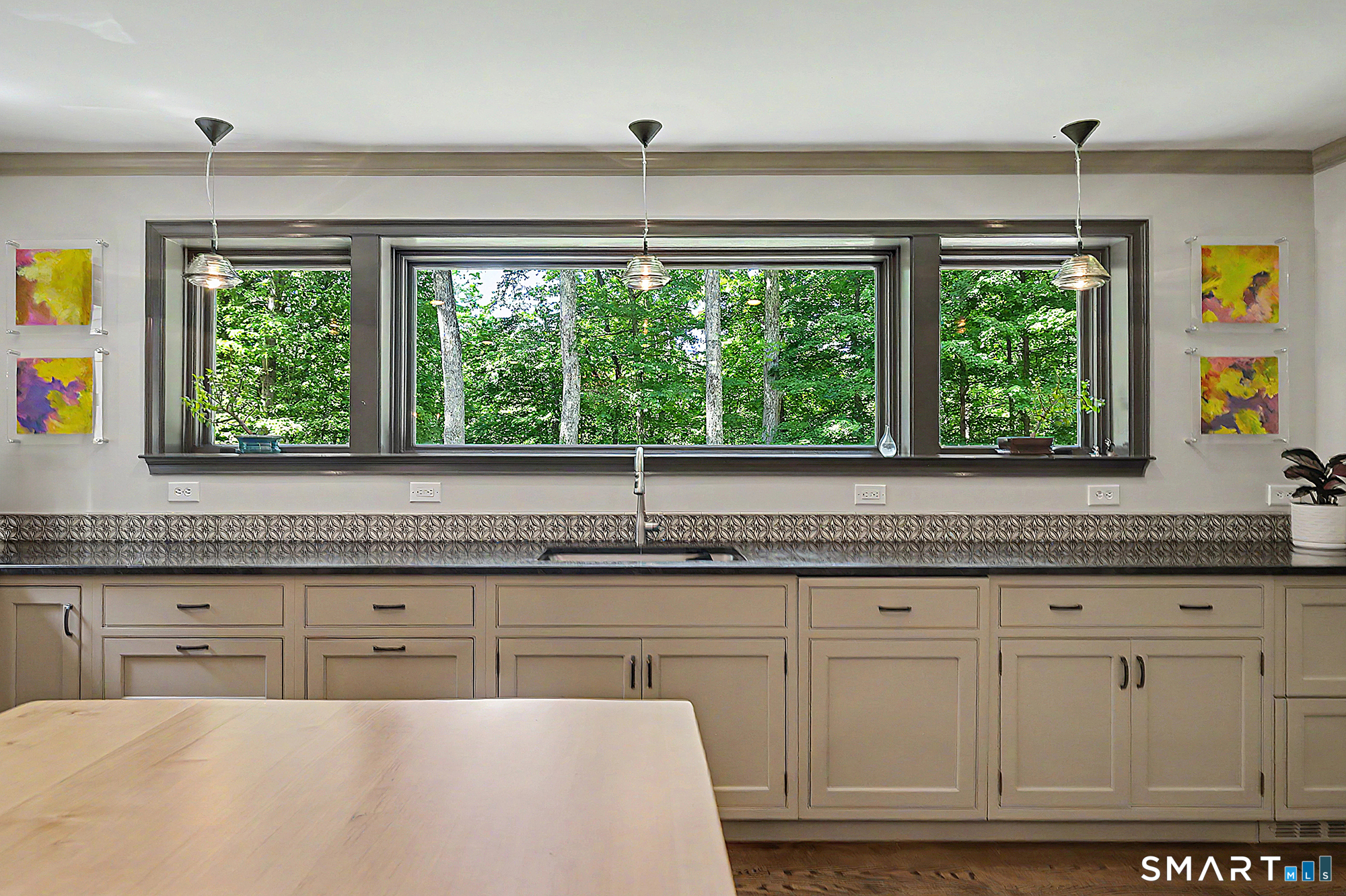 33 Hunter Lane Ridgefield, CT 06877 - Photo 8 of 39 a kitchen with granite countertop a stove and white cabinets