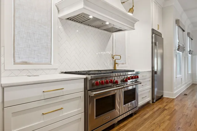a view of a room with wooden floor and closet