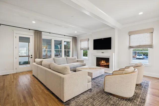 a view of a room with wooden floor