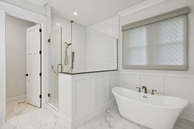 a bathroom with a toilet and a sink