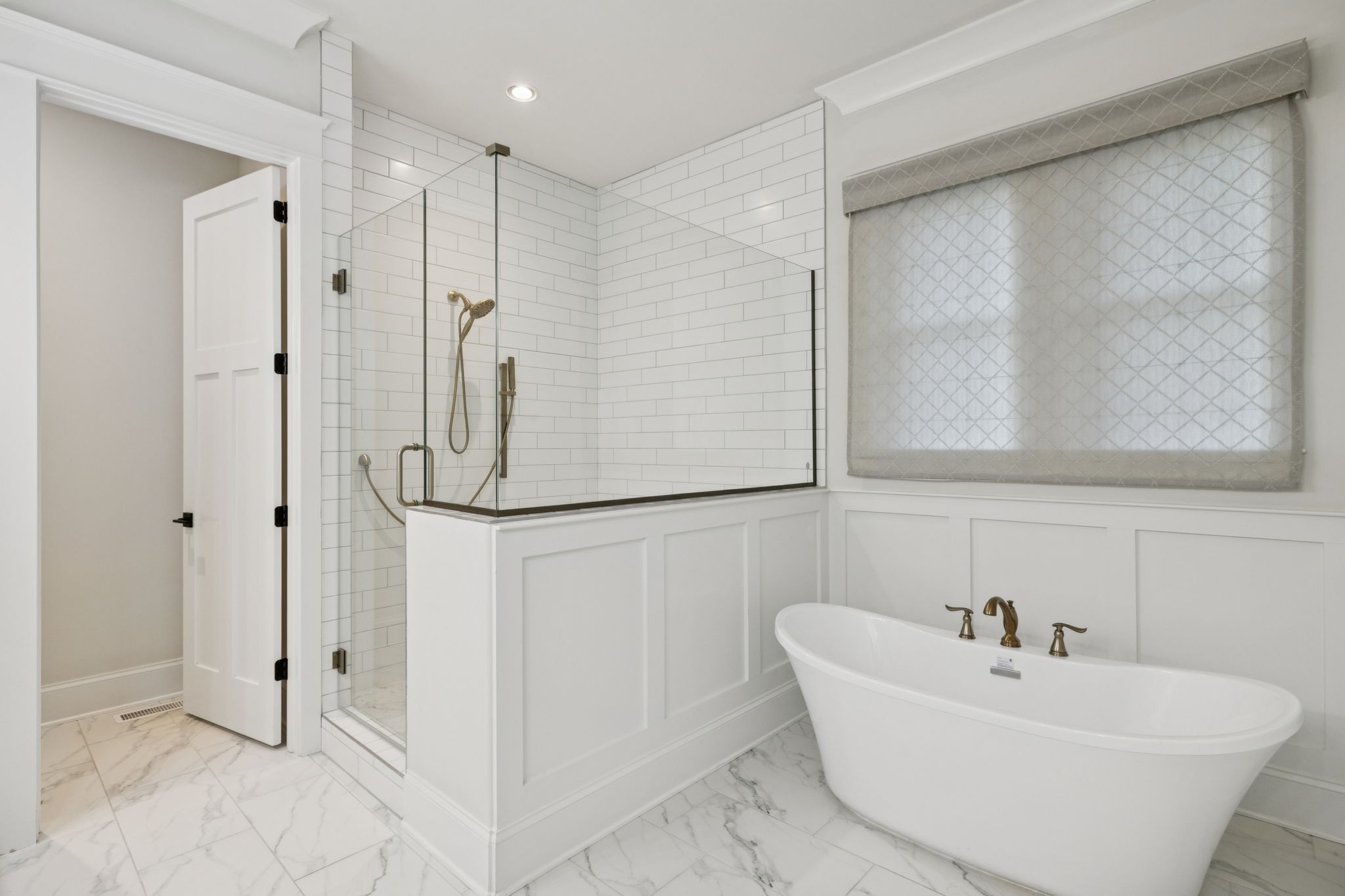 813 Hillsboro Road Franklin, TN 37064 - Photo 33 of 79 a bathroom with a bathtub and a shower