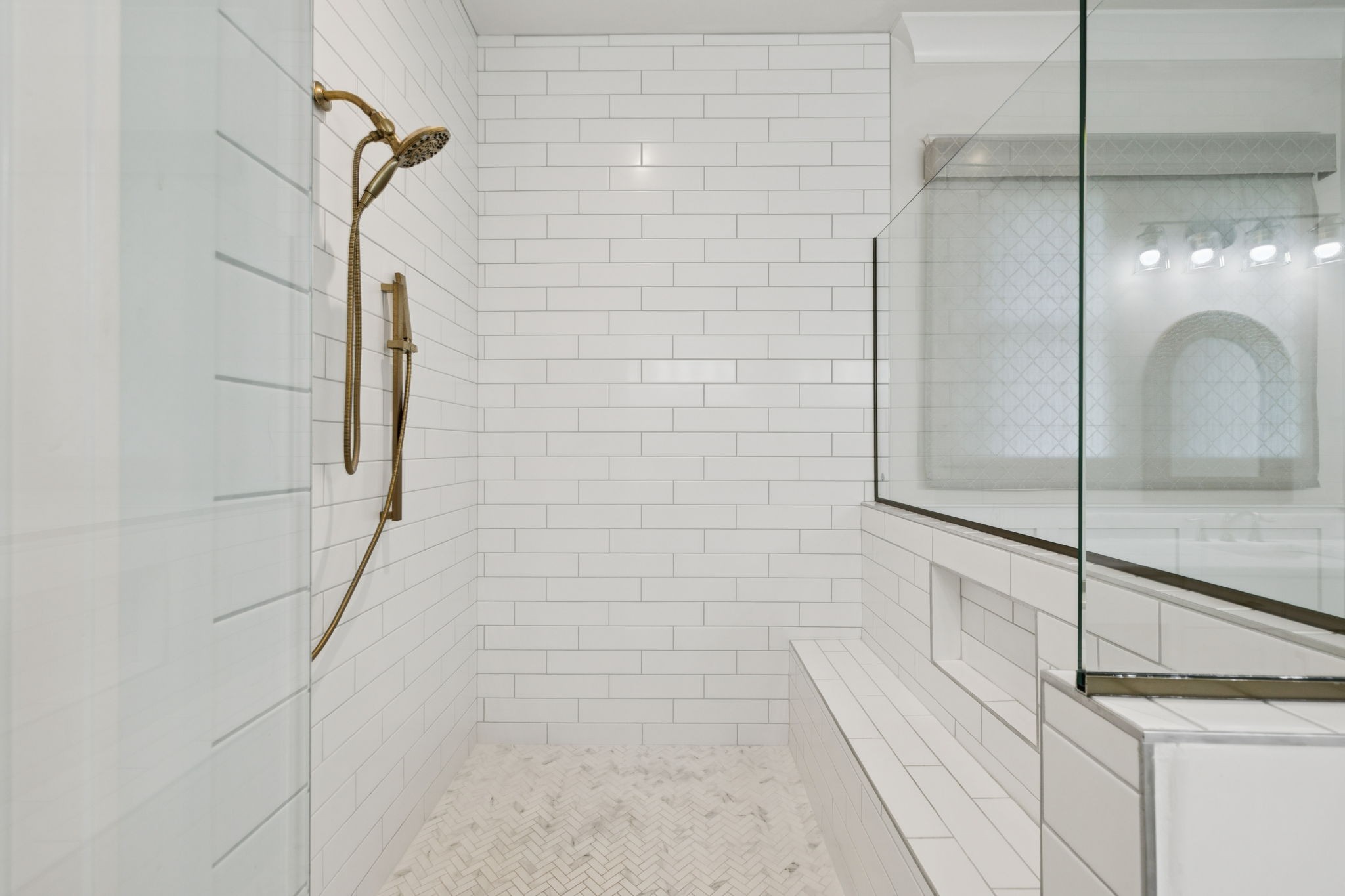 813 Hillsboro Road Franklin, TN 37064 - Photo 34 of 79 a bathroom with a glass shower door