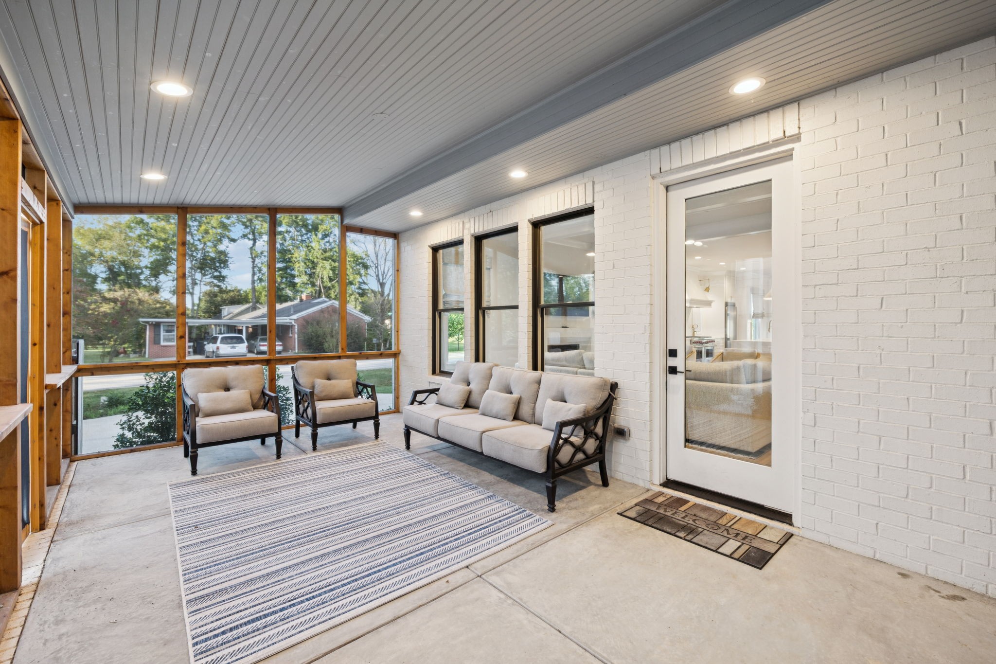 813 Hillsboro Road Franklin, TN 37064 - Photo 65 of 79 a living room with furniture and large windows