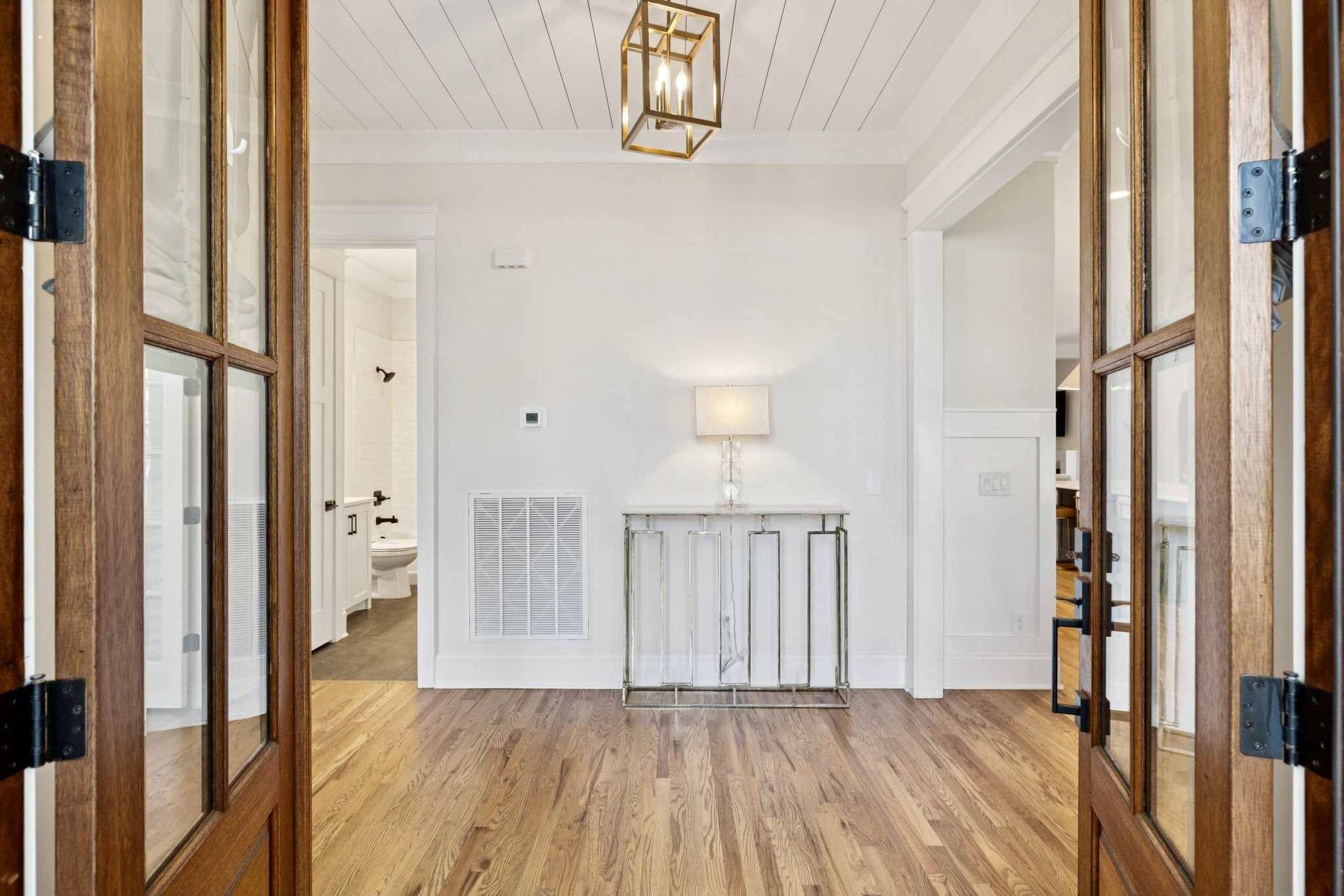 813 Hillsboro Road Franklin, TN 37064 - Photo 7 of 79 a view of a hallway with wooden floor and entryway