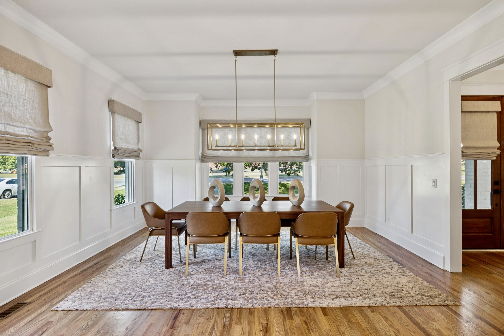813 Hillsboro Road Franklin, TN 37064 - Photo 9 of 79 a dining room with furniture a chandelier and wooden floor