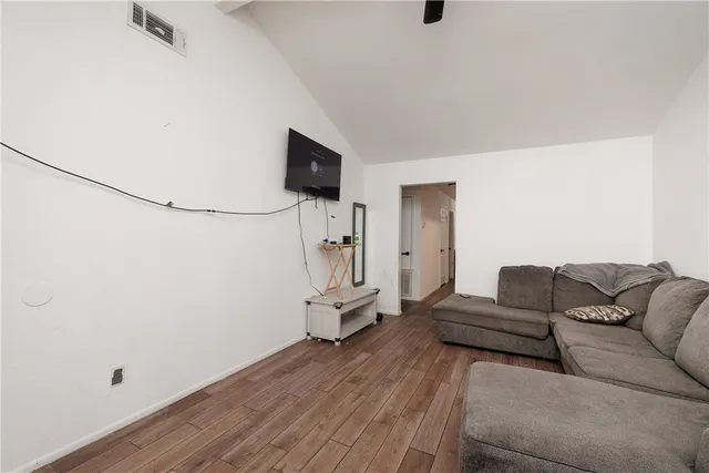 a living room with furniture and a couch