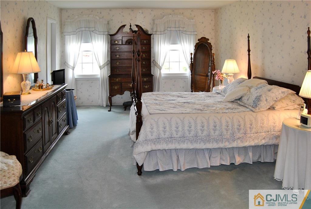 18 Krebs Road Plainsboro, NJ 08536 - Photo 13 of 24 a bedroom with a bed window and dresser