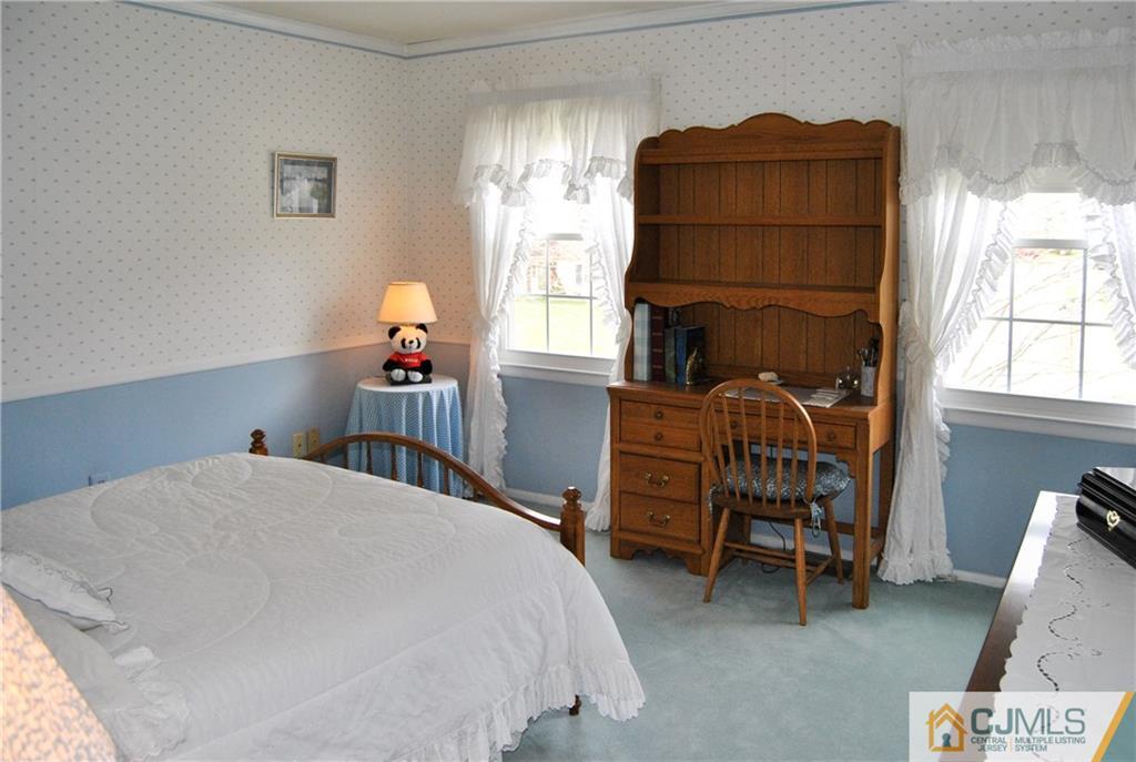 18 Krebs Road Plainsboro, NJ 08536 - Photo 15 of 24 a bedroom with a bed and a window