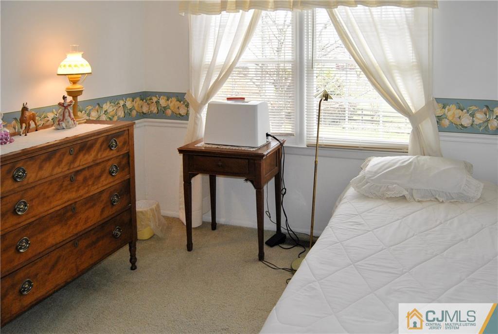 18 Krebs Road Plainsboro, NJ 08536 - Photo 16 of 24 a bedroom with a bed and a window
