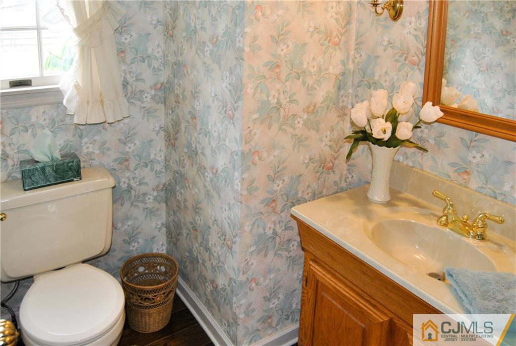 18 Krebs Road Plainsboro, NJ 08536 - Photo 18 of 24 a bathroom with a sink and a toilet