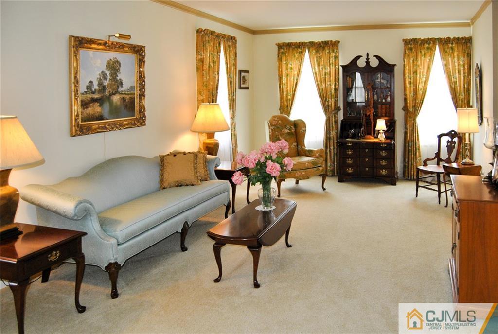 18 Krebs Road Plainsboro, NJ 08536 - Photo 3 of 24 a living room with furniture and wooden floor