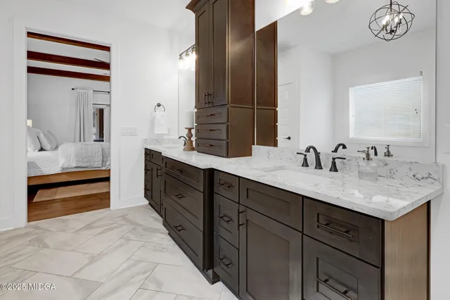 a kitchen with a stove and a refrigerator