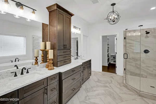 a kitchen with stainless steel appliances a stove sink and refrigerator