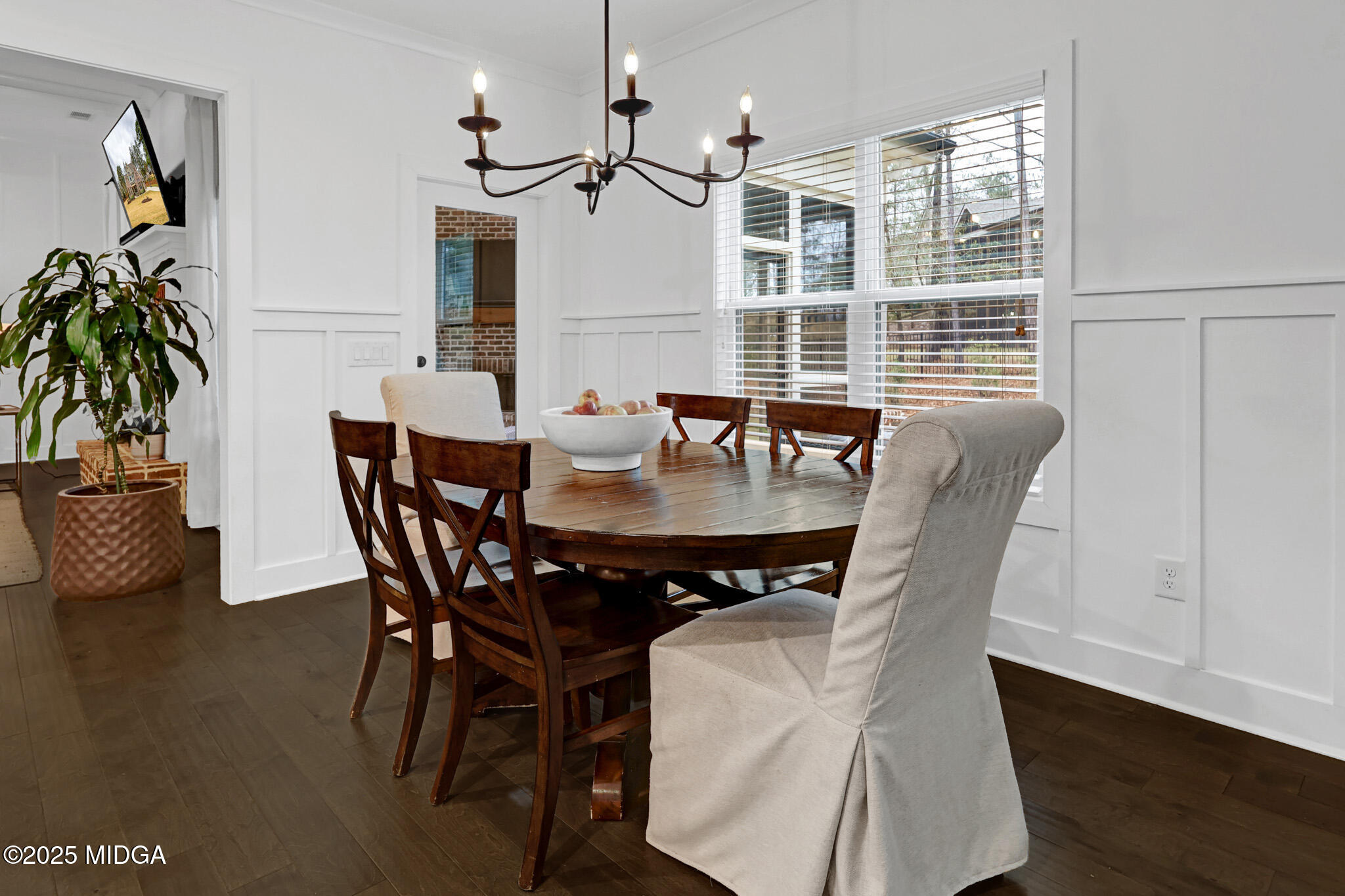 205 Chastain Drive Forsyth, GA 31029 - Photo 35 of 72 a view of a dining room with furniture window and wooden floor