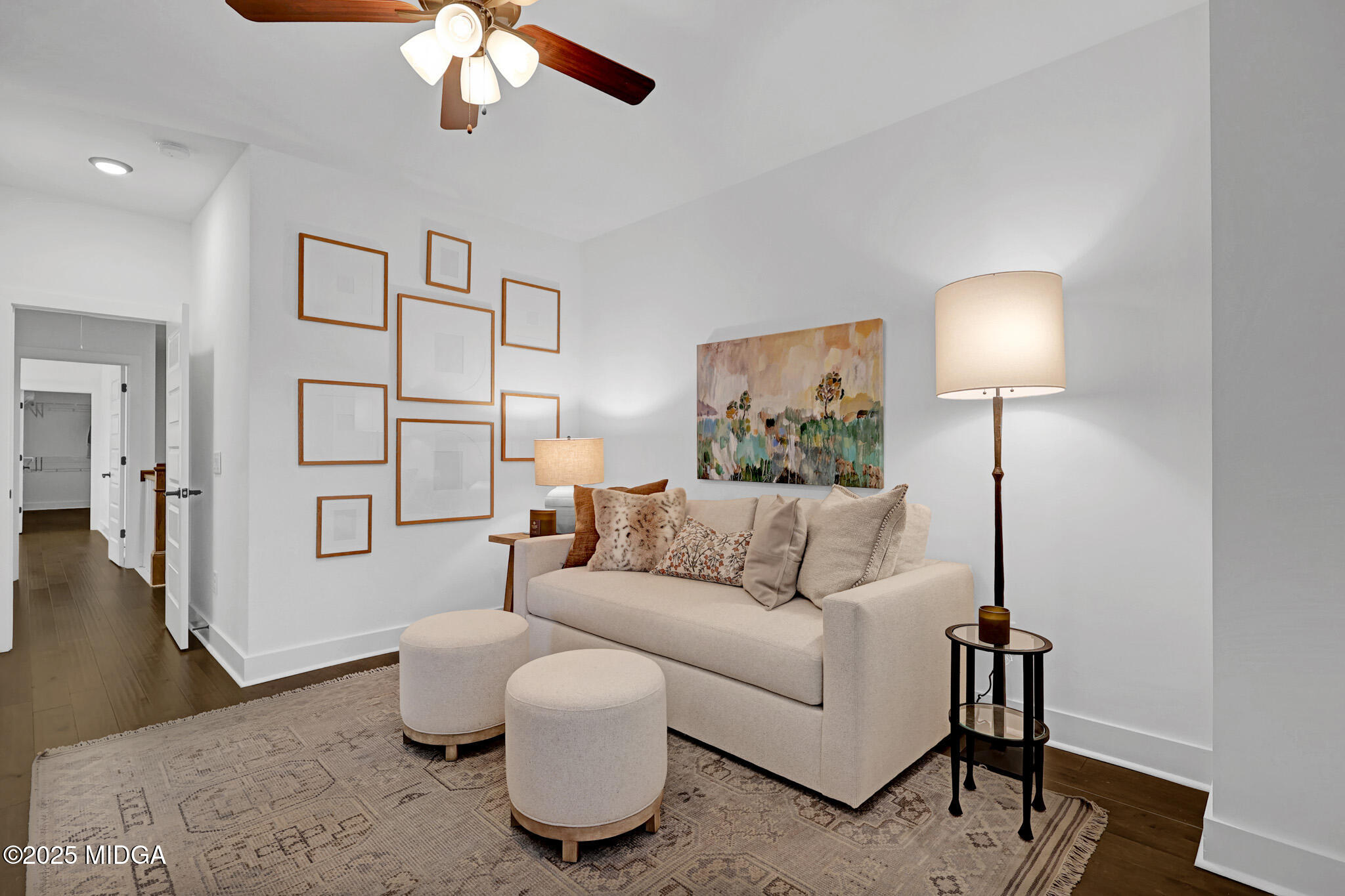 205 Chastain Drive Forsyth, GA 31029 - Photo 51 of 72 a living room with furniture and a lamp