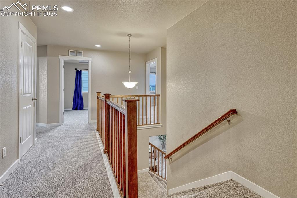 11298 Scenic Brush Drive Peyton, CO 80831 - Photo 15 of 50 a view of hallway with stairs