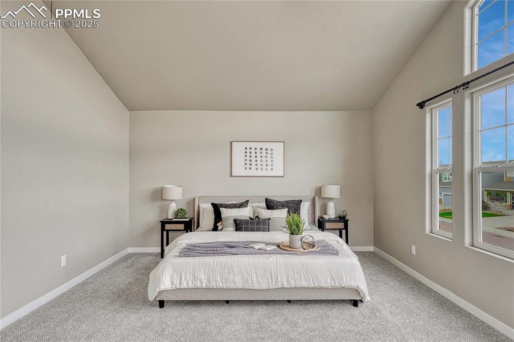 11298 Scenic Brush Drive Peyton, CO 80831 - Photo 17 of 50 a bedroom with a bed and a window