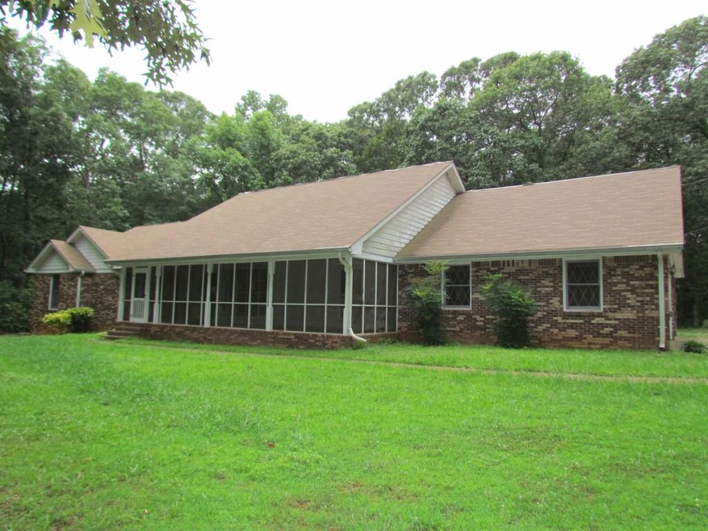 763 King Road Stone Mountain, GA 30088 - Photo 1 of 1 Opportunity Knocking! Classic Brick/Frame Traditional Ranch with Character & Charm on 3.9 Acres in the Heart of Stone Mountain,Georgia.