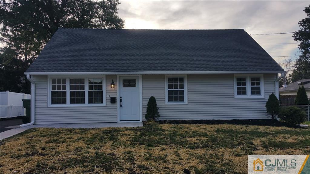 10 Richmond Road Edison, NJ 08817 - Photo 1 of 12 a front view of a house with garden