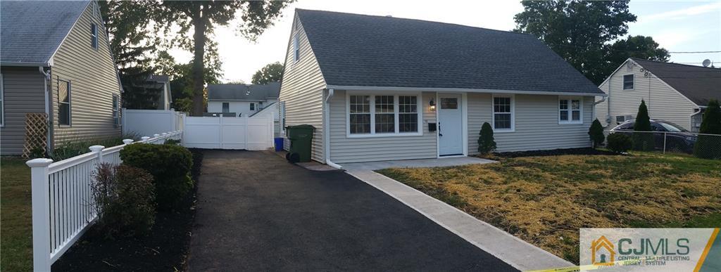 10 Richmond Road Edison, NJ 08817 - Photo 2 of 12 a front view of a house with garden