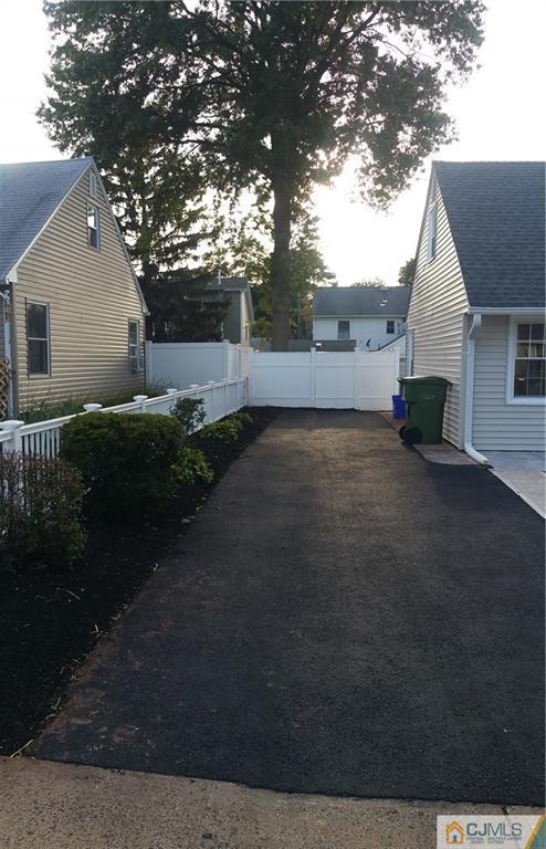 10 Richmond Road Edison, NJ 08817 - Photo 3 of 12 a view of a house with a yard