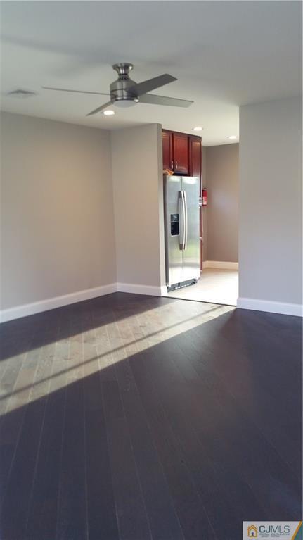 10 Richmond Road Edison, NJ 08817 - Photo 5 of 12 a view of a hallway with a kitchen