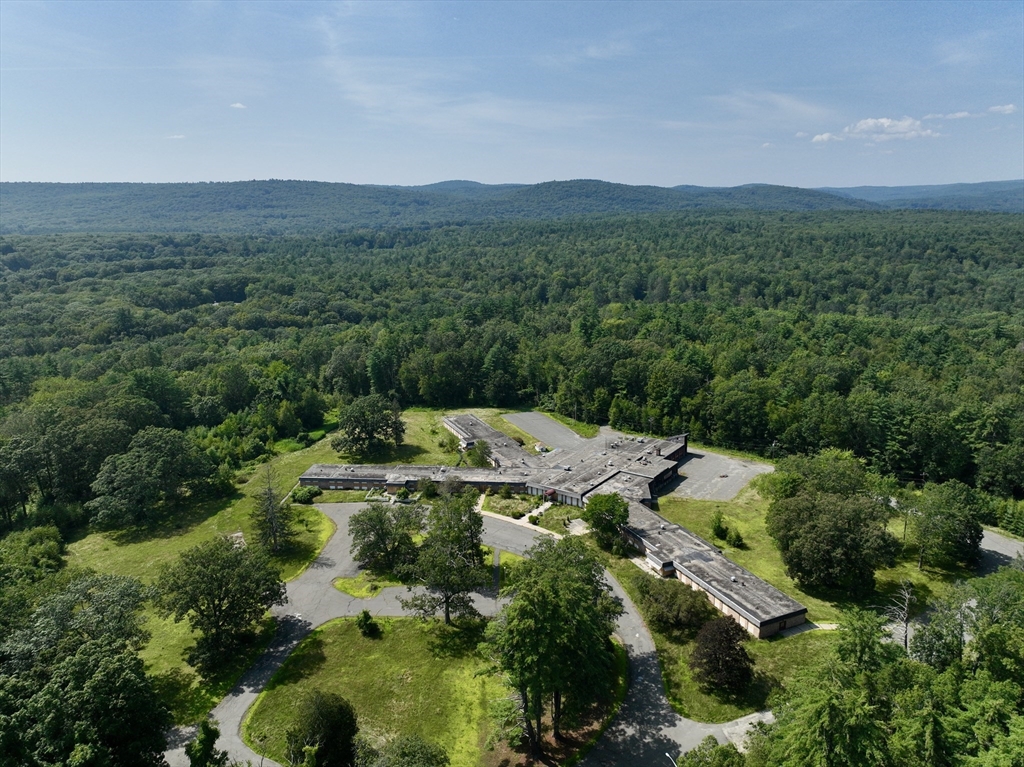 222 River Road Northampton, MA 01053 - Photo 2 of 14 an aerial view of a house with yard and outdoor seating