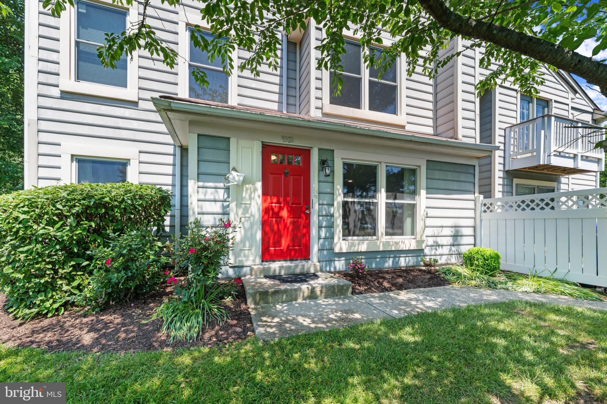 9302 Player Drive, Unit 155 Laurel, MD 20708 - Photo 3 of 43 front view of a house with a yard