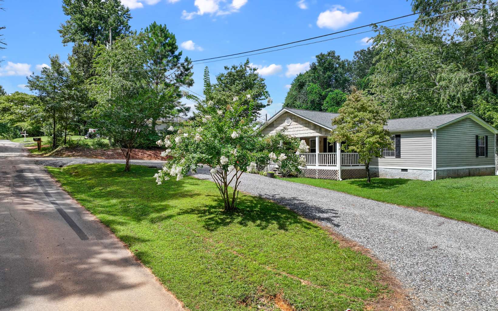 611 Wash Wilson Road Blue Ridge, GA 30513 - Photo 2 of 26 a front view of a house with a yard