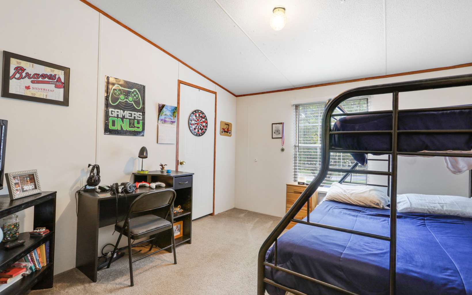 611 Wash Wilson Road Blue Ridge, GA 30513 - Photo 22 of 26 a bedroom with furniture and a window