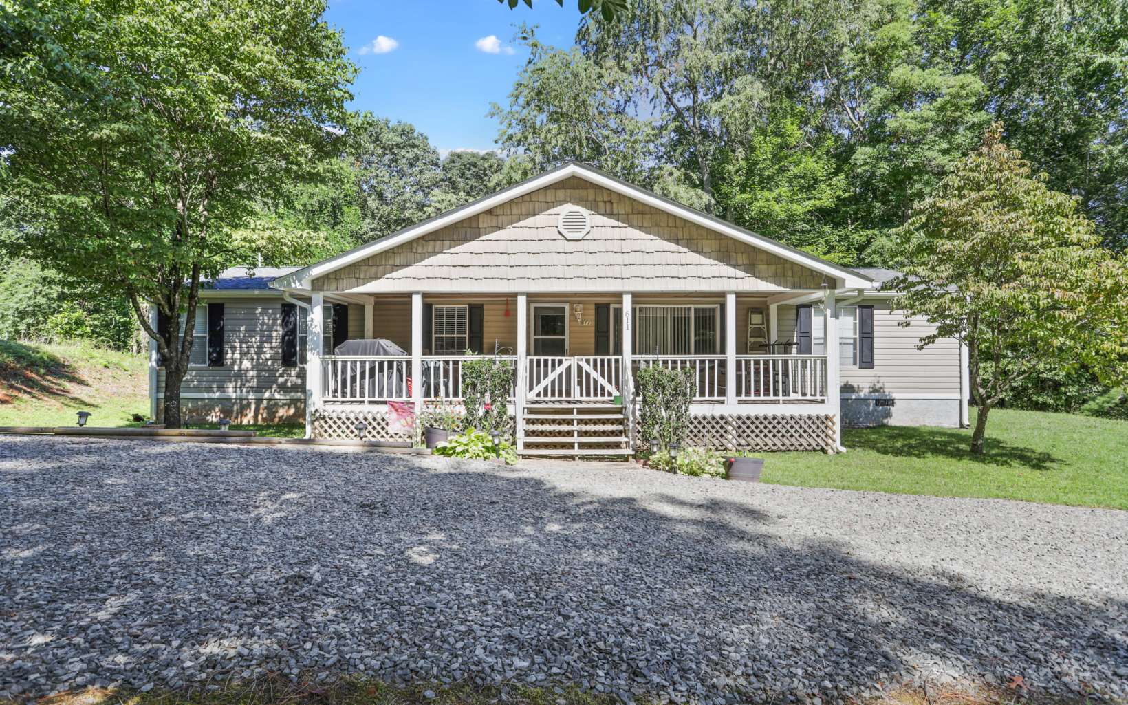 611 Wash Wilson Road Blue Ridge, GA 30513 - Photo 26 of 26 a view of front of a house with a yard and porch