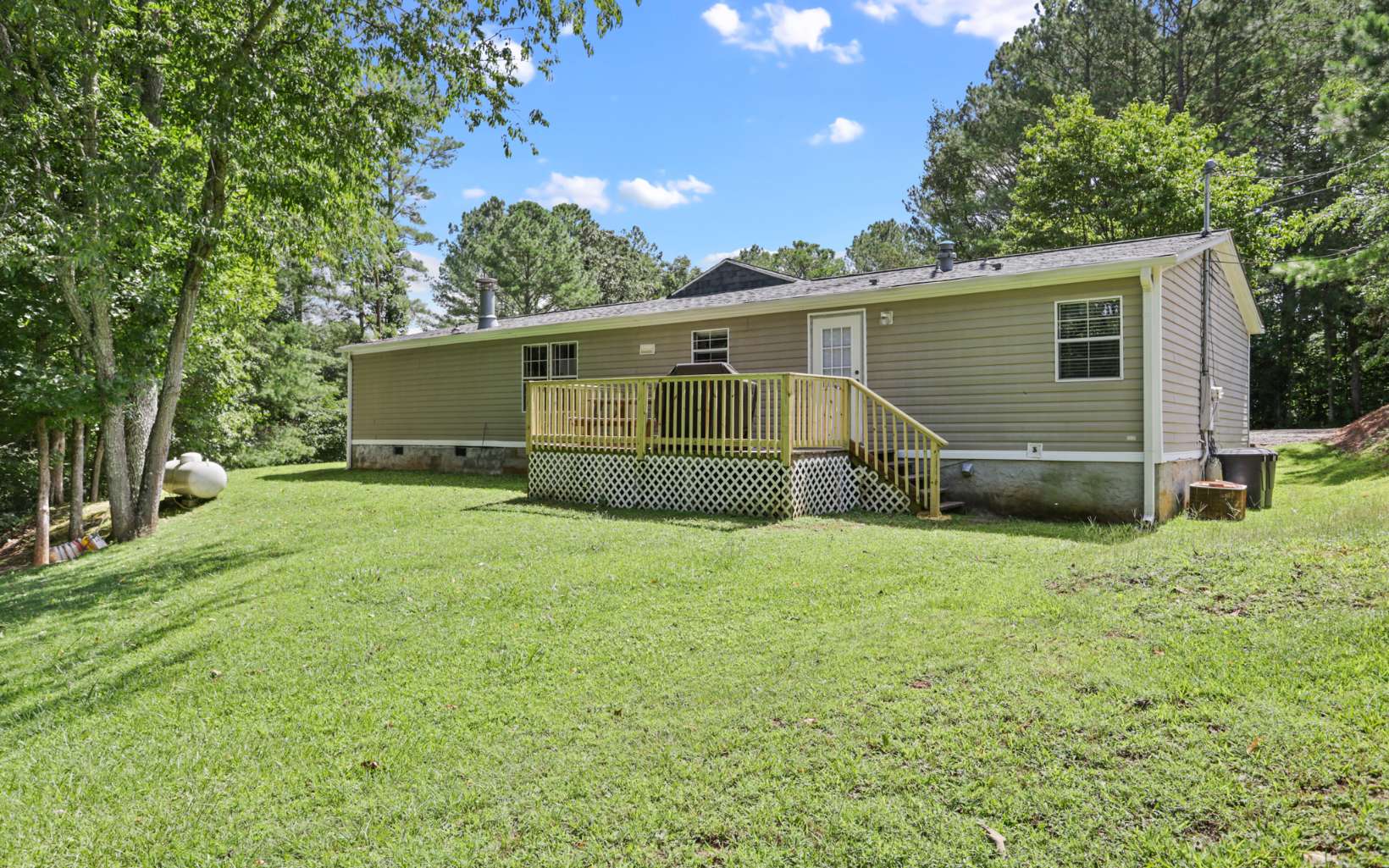 611 Wash Wilson Road Blue Ridge, GA 30513 - Photo 6 of 26 front view of a house with yard