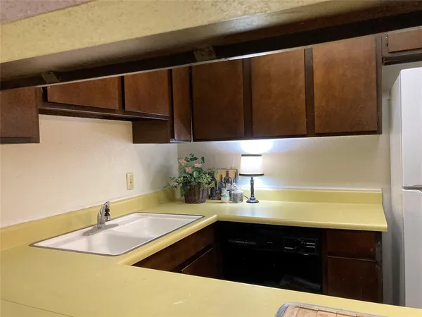 a view of a bathroom with a tub and shower