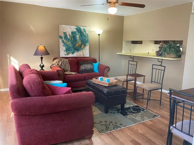 a living room with furniture and a table