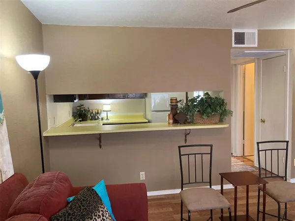 a view of balcony with furniture