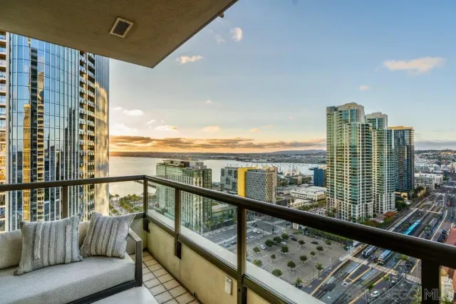 a bed room with a bed and a night stand