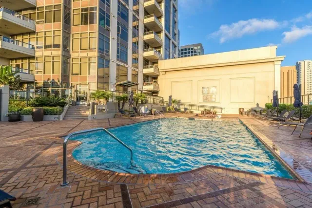 a view of a building with a door open to a building